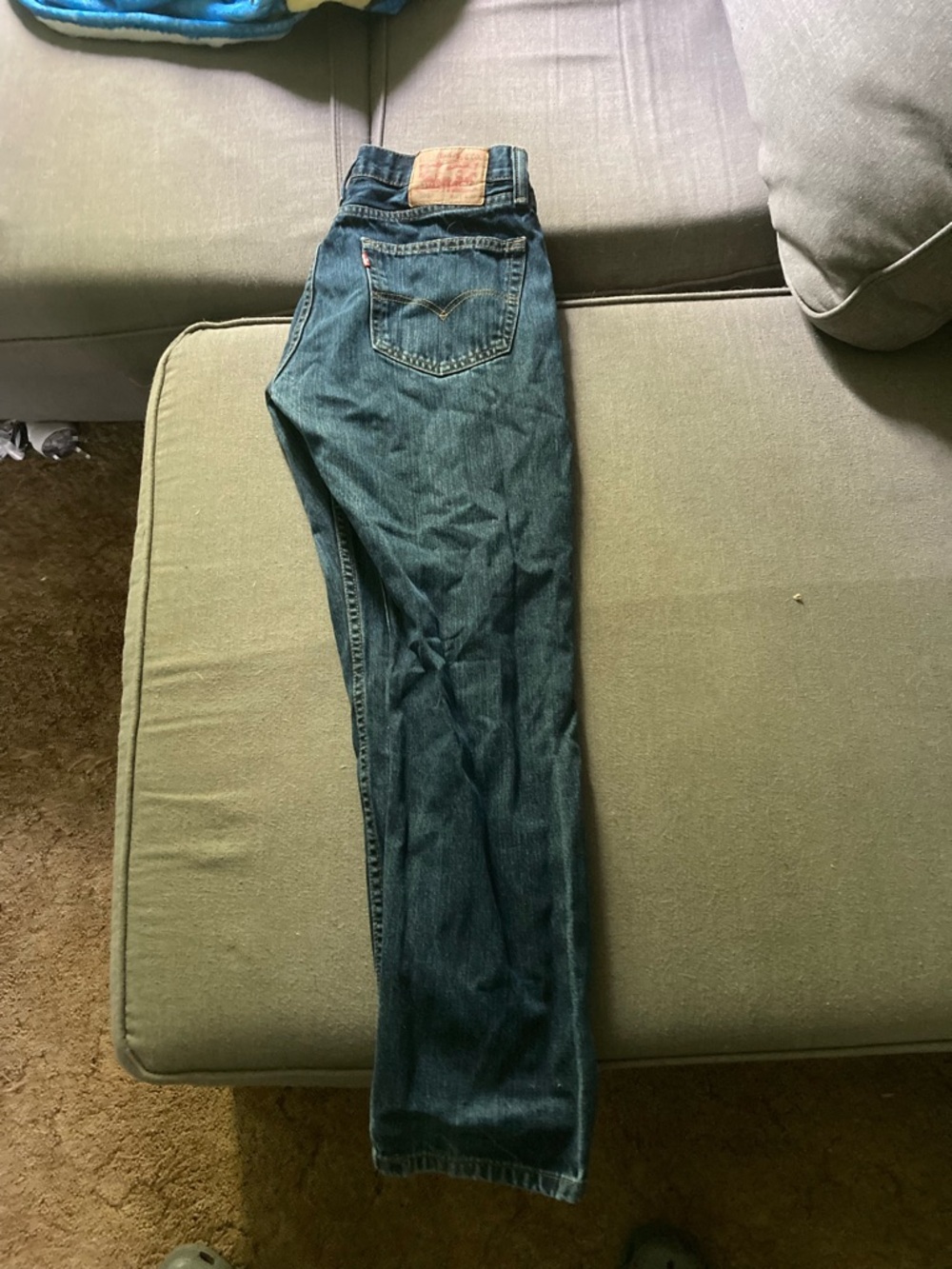 Levi's 505 blue denim jeans with tan leather patch
